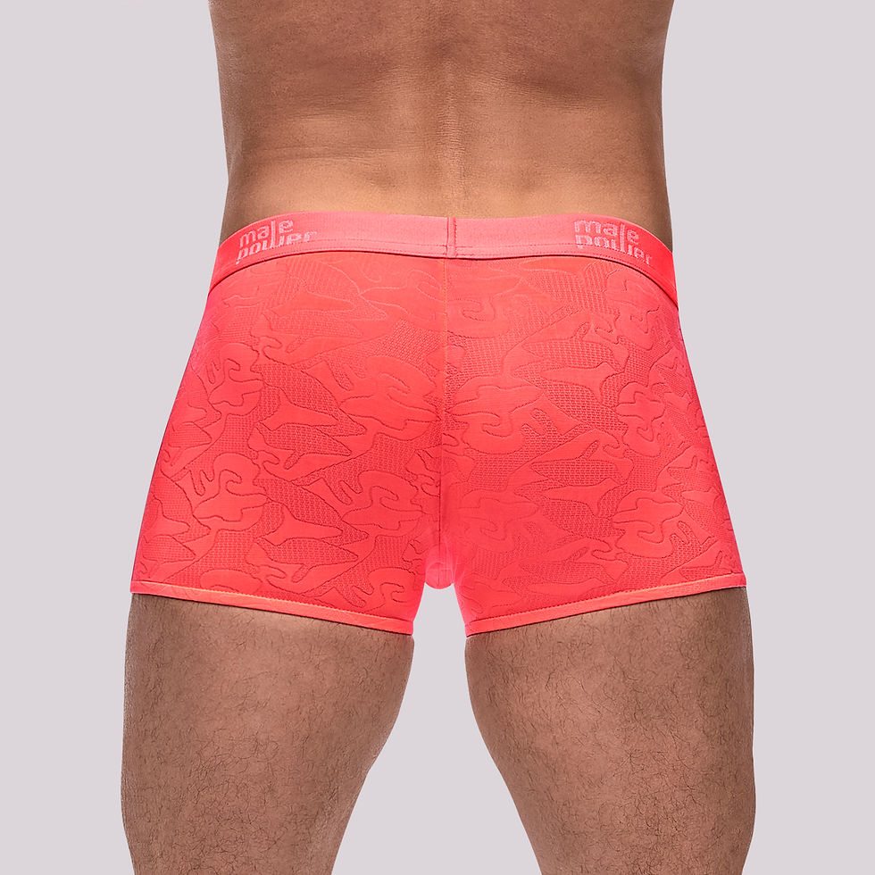 Thumbnail: Model shown close up back view in stylish and alluring modern men's trunk short in coral.