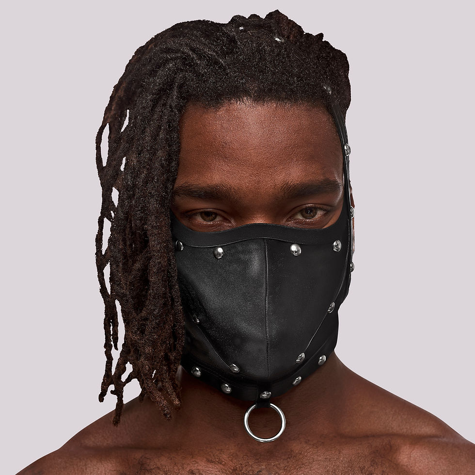 Thumbnail: Confident male front view wearing faux leather face mask with metal studs and ring has adjustable Velcro straps 