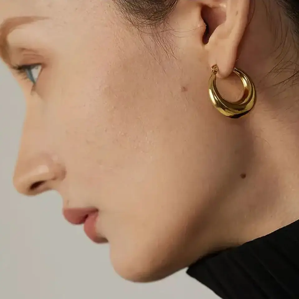 Thumbnail: Twisted Bamboo Gold Hoop Earrings - Small Stainless Steel