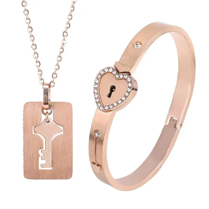 Thumbnail: Couples Heart Lock Bracelet & Key Necklace Set - Stainless Steel