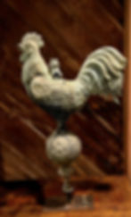 Antique Full‑bodied French cast zinc rooster weathervane with weathered patina on stand showing natural wear and patina.