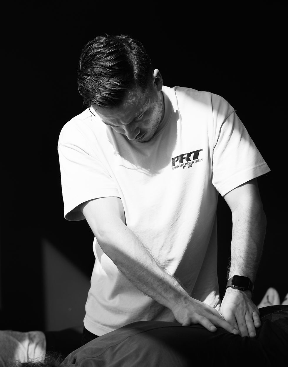 chiropractor treating patient at PRT Scarborough clinic