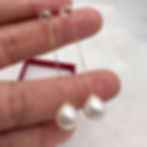 dangle pearl earrings 1.5-inch white on hand