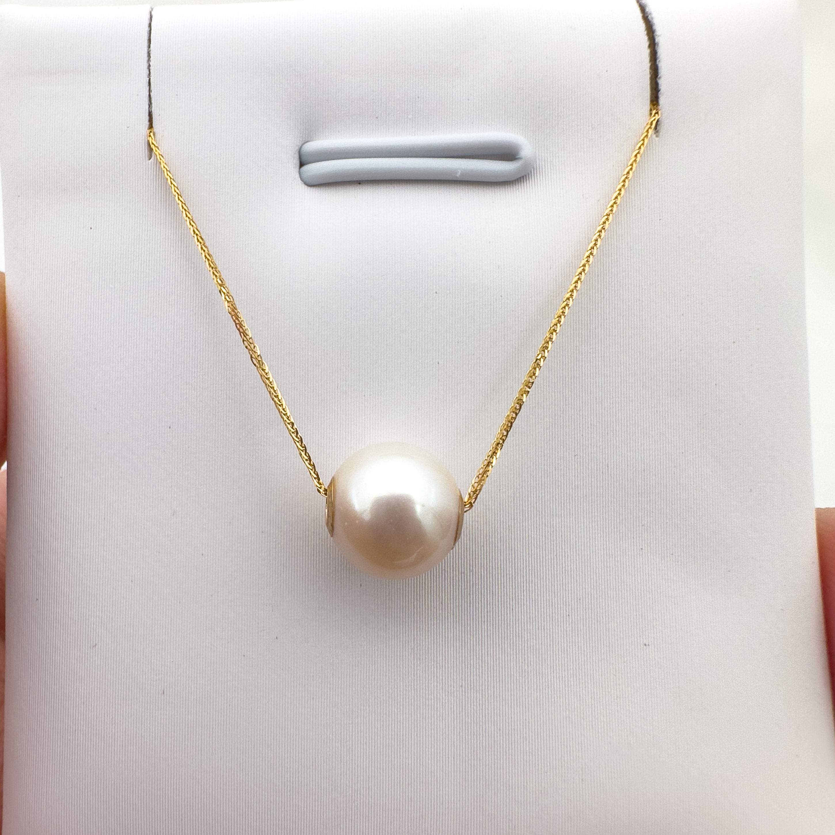perforated pearl pendant white