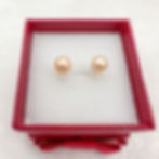 pearl earrings stud bun 7mm pink top view