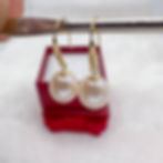 hook pearl earrings white side view