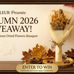 SKfleur Autumn 2026 Giveaway banner featuring a dried sunflower bouquet wrapped in cream paper with a twine bow, displayed on a wooden stand with autumn leaves and pinecones