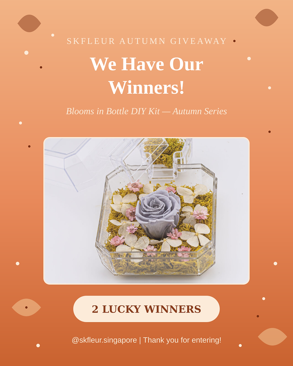 SKfleur Blooms in Bottle DIY Kit Autumn Series giveaway winner announcement, featuring a preserved grey rose in a bottle arrangement on an orange autumn background