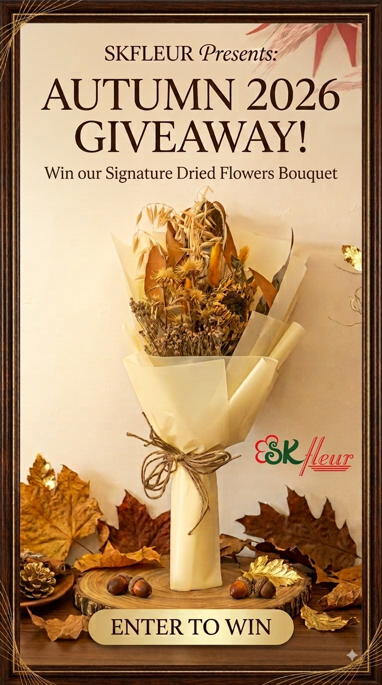 SKfleur Autumn 2026 Giveaway banner featuring a dried Flower bouquet wrapped in cream paper with a twine bow, displayed on a wooden stand with autumn leaves and pinecones