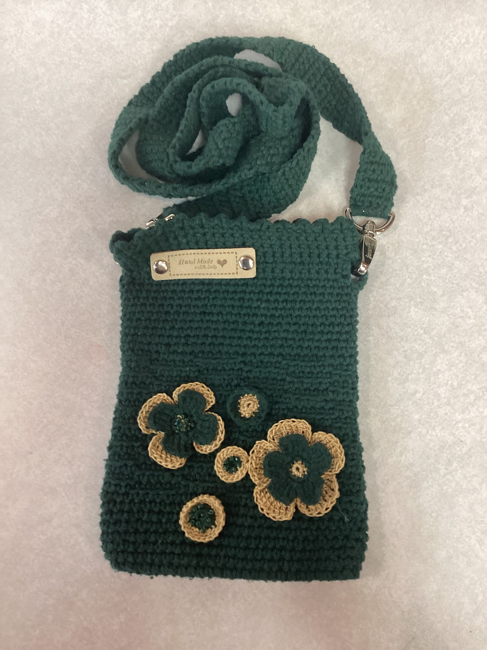 Thumbnail: Handmade knitted pouches by Erika
