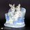 Thumbnail: VTG Porcelain Rabbits Figurine Boy Girl Snuggling On Couch