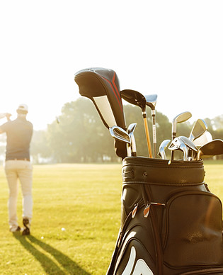 back-view-male-golfer-swinging-golf-club.jpg