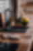 beautiful kitchen with butcher block counter tops with black sink and faucet