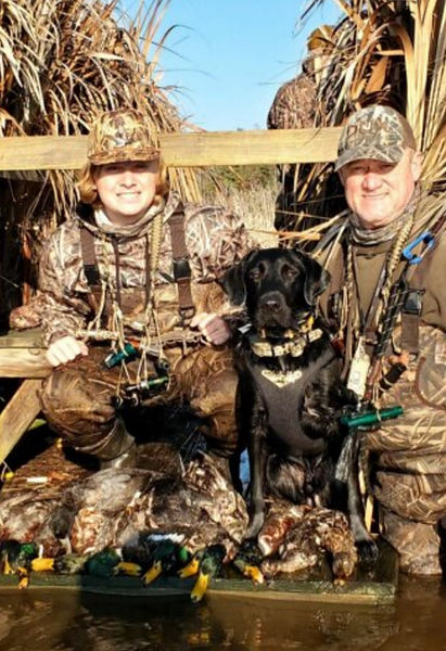 Son, Dad, and Dog in Duck Blind