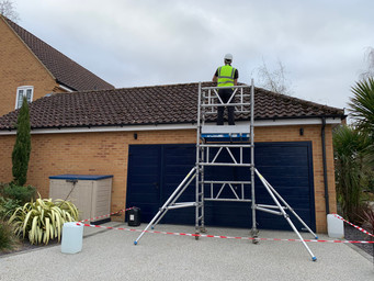 Roofcleaningwithscaffoldtower.jpeg