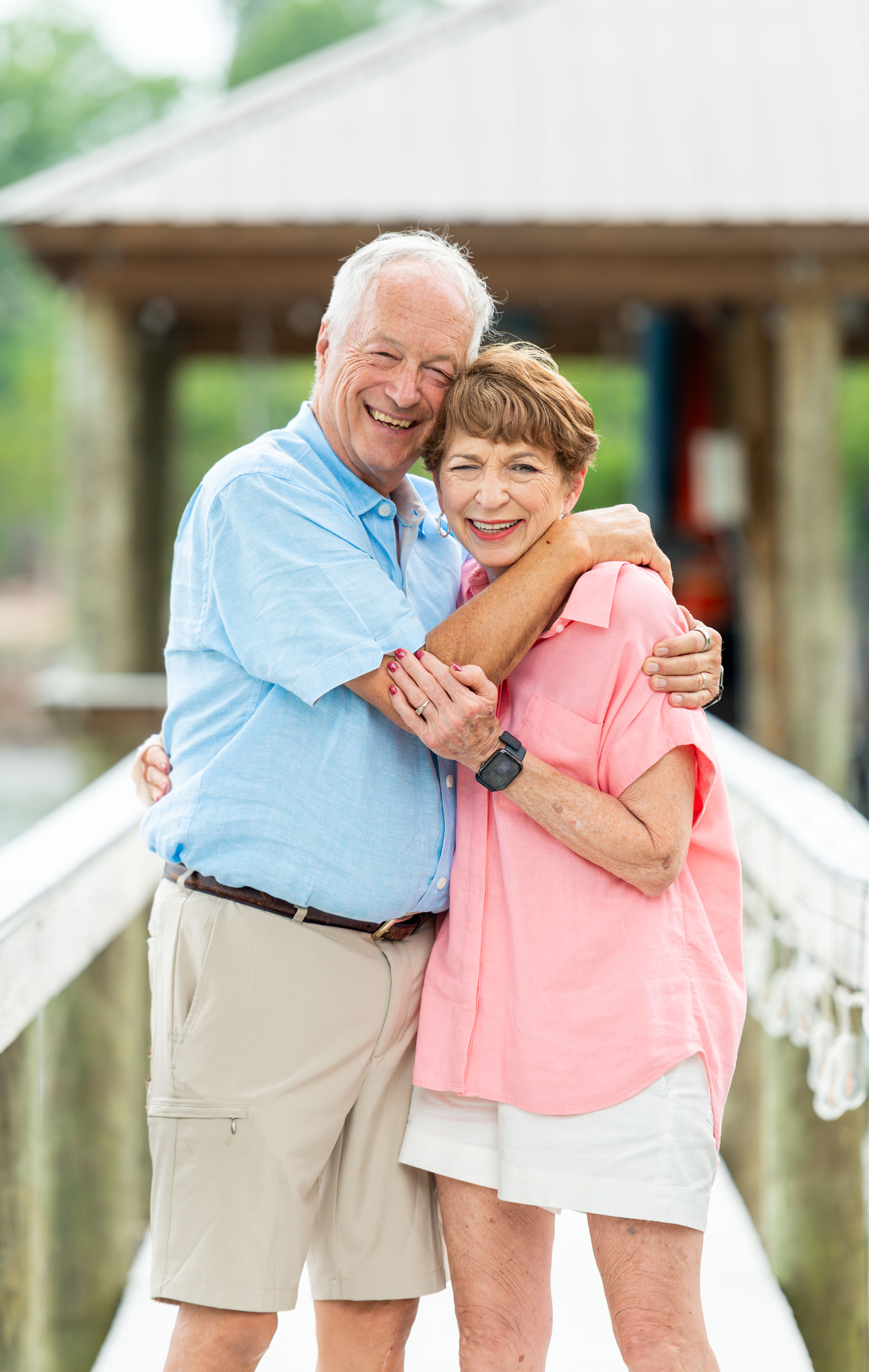 Gorgeous photo of an older couple smiling for the camera at their home on Lake Wylie.  Belmont, NC Family Photographer. 