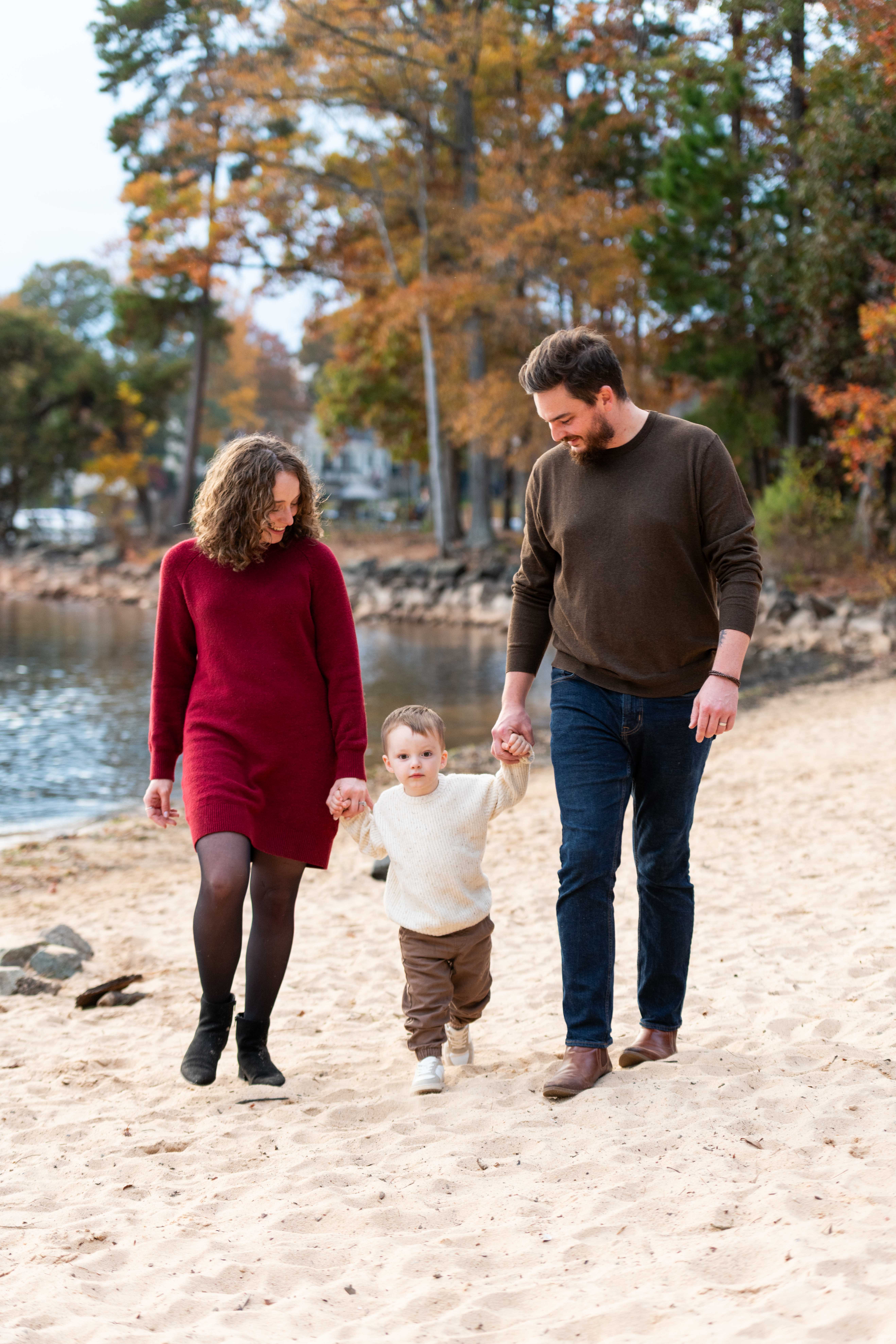 Family walking on the beach at Jetton Park in Cornelius, NC.  Lake Norman Family Photographers. 