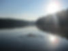 Girl swimming in beautiful glass lake