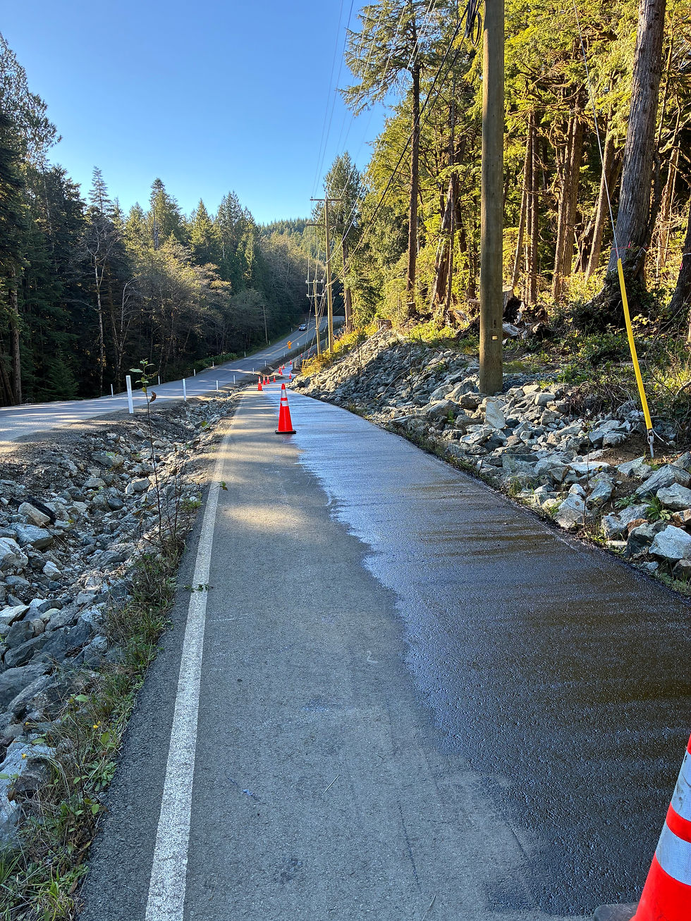 Sealcoat applied to public walkway in Tofino.