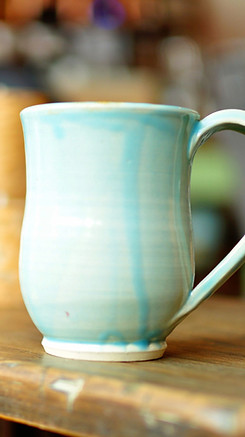 focused photo of a blue ceramic mug_edit