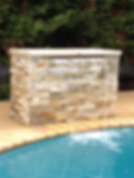 Limestone cladding on block base