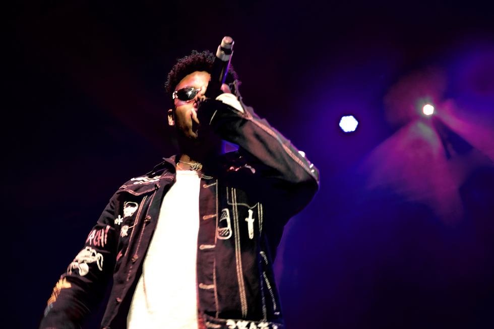 photo of Gho$t! performing with a microphone at Stage AE in Pittsburgh