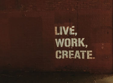 Live, Work, Create text on a wall