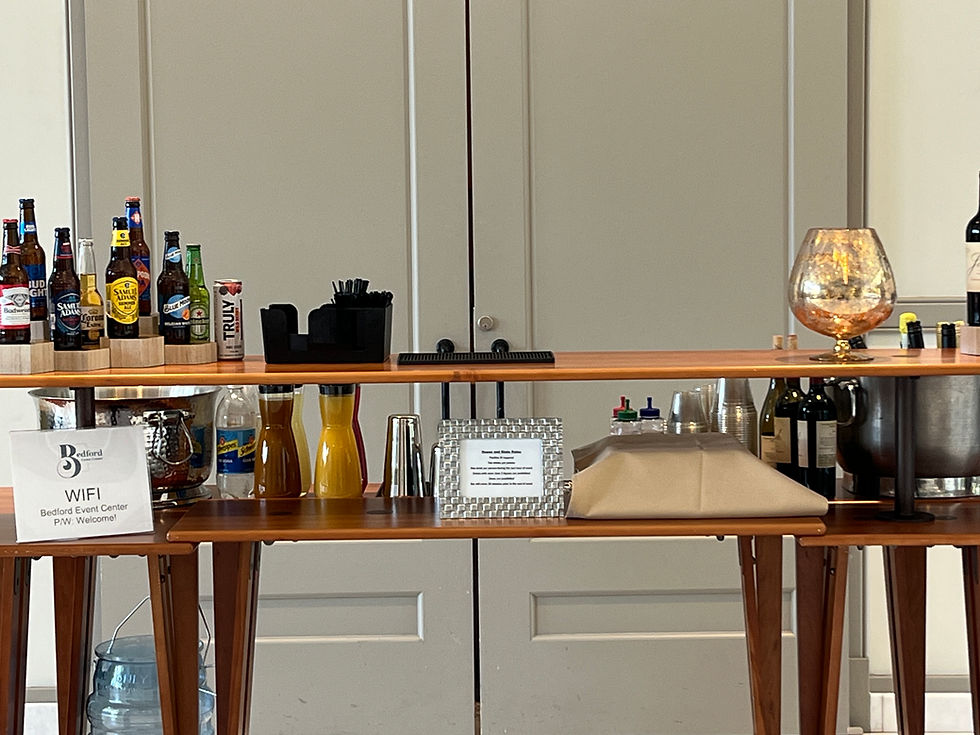Close-Up of Coffee and Bar Setup at Bedford Event Center Featuring Wine, Soft Drinks, and Custom Bev