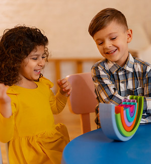 Kids playing with toys at Élodie’s Playhouse Café