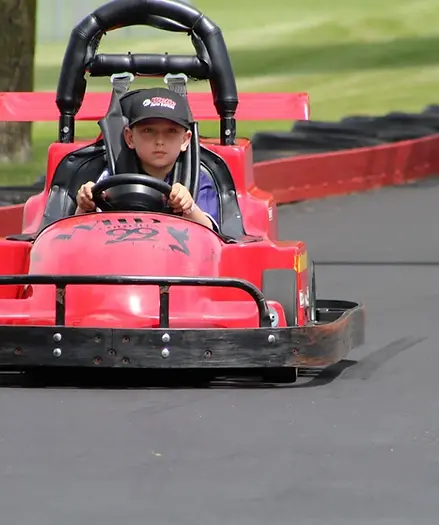 Child driving go-kart at Summerland Fun Park in Sauk Rapids, MN
