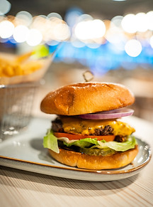 Burger and fries served at Level Up Bowl & Bistro restaurant in Rolling Hills Estates