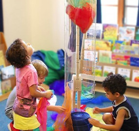 Kids playing in Wind Tunnel at Élodie's Playhouse Café
