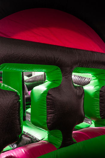 Close-up of inflatable obstacle course tunnel at Bounce City Idaho Falls.
