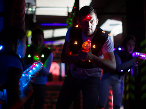 adults playing laser tag at the fun lab