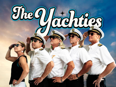 The Yachties in captain hats saluting