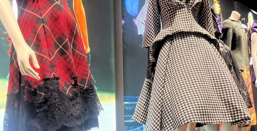 Close-up of Alexander McQueen-inspired costume with theatrical lighting, embroidery, and dramatic silhouette from House of McQueen Off-Broadway show. Styled review by fashion blogger Arbel Rabi.
