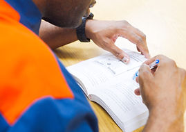A student studying a textbook