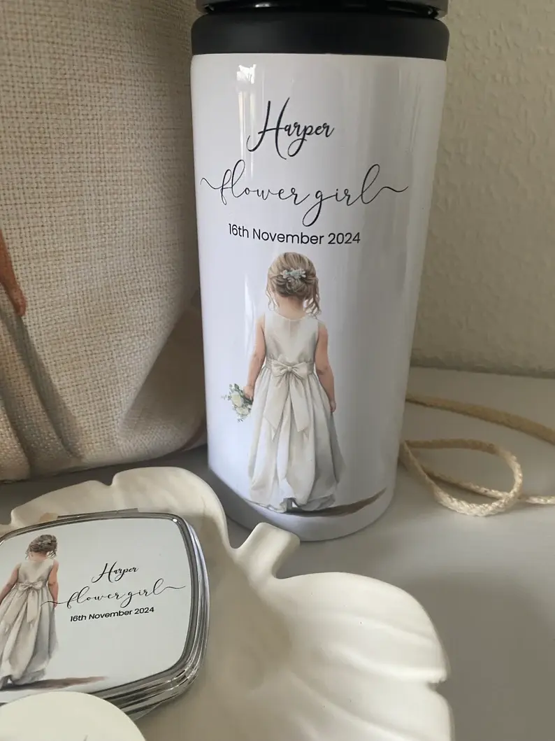 Thumbnail: view of the personalised flower girl gift hamper showcasing a canvas pouch, drawstring bag, custom water bottle, and a compac