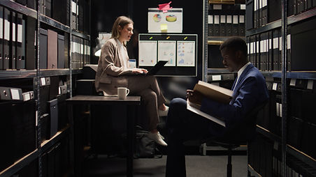 officers-sifting-through-evidence-files.jpg