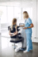 woman-physiotherapy-making-physical-exercises-with-qualified-therapist.jpg