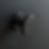 Black metal knob on dark surface