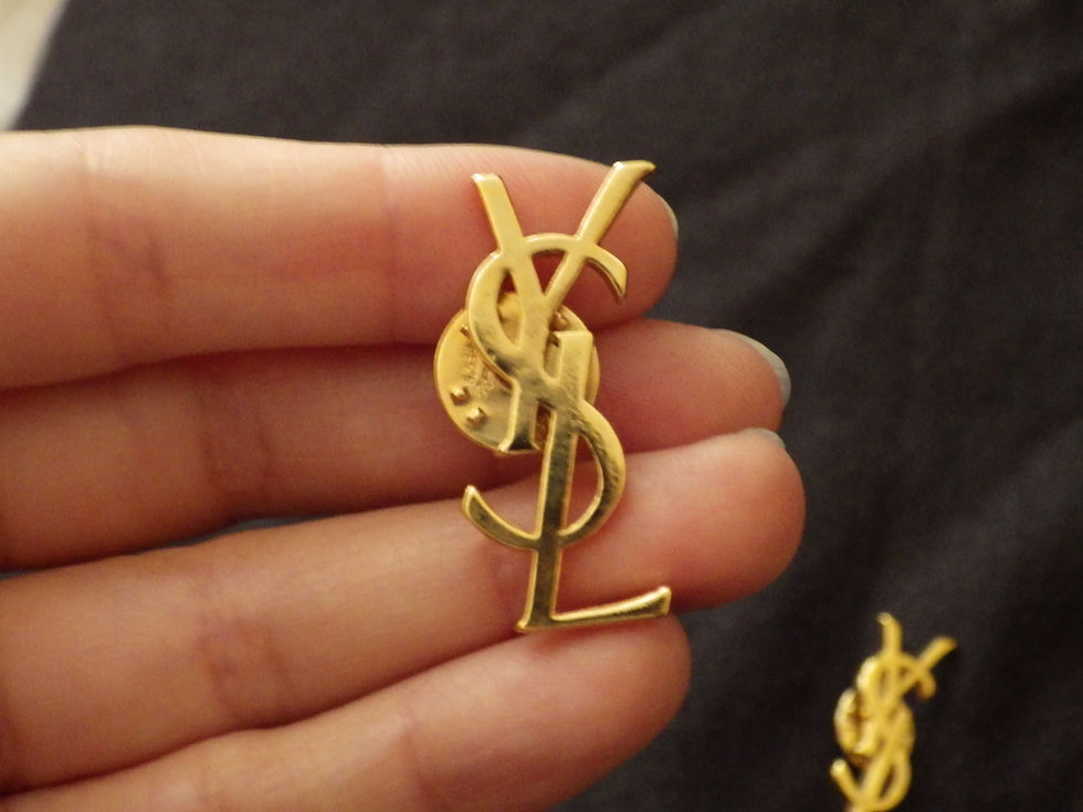 Miniature : pin's Yves saint laurent parfums vintage