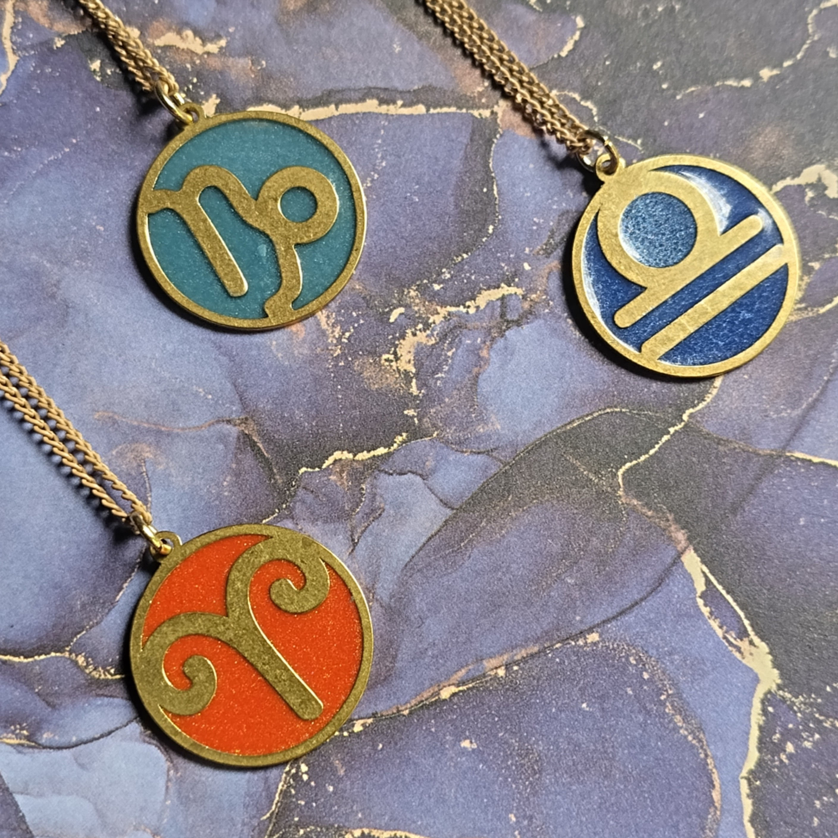 Zodiac pendant. Brass and Resin