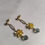 Thumbnail: Lotus earrings. Brass and Glass