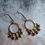 Thumbnail: Enchanter Earrings. Brass and Glass
