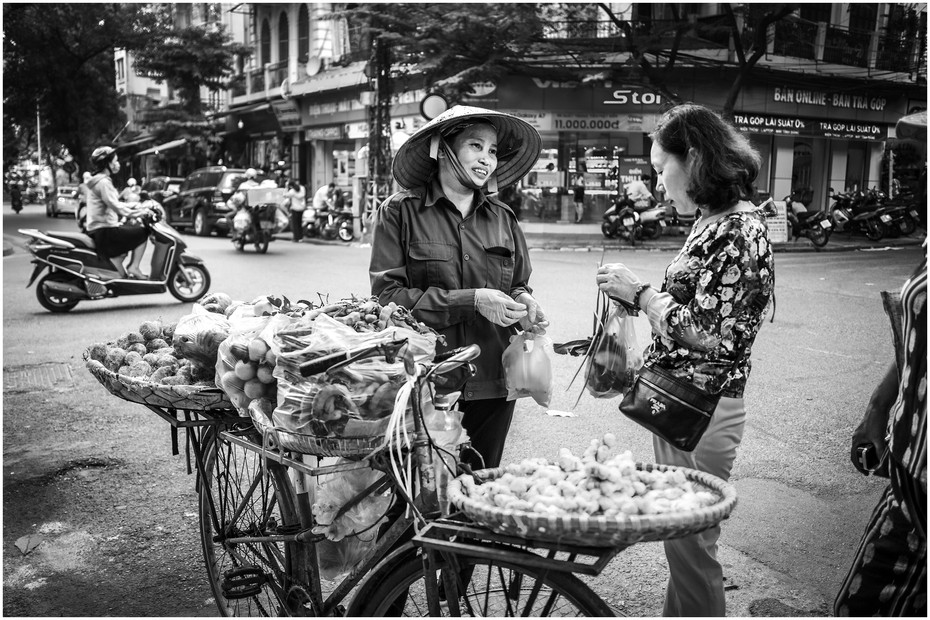 Vietnamese woman selling on the streets of Hanoi