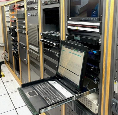 Equipment racks with custom split signal broadcast equipment