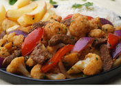 Saltado de Coliflor con Carne
