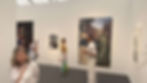 People at an art gallery viewing paintings on white walls. A man in white stands near large artwork. Visitors observe and take photos.Mise-en-scène at Canyon de Chelly (2025), by Shane Keisuke Berkery. Southern Guild Gallery, Frieze, Los Angeles, 2026