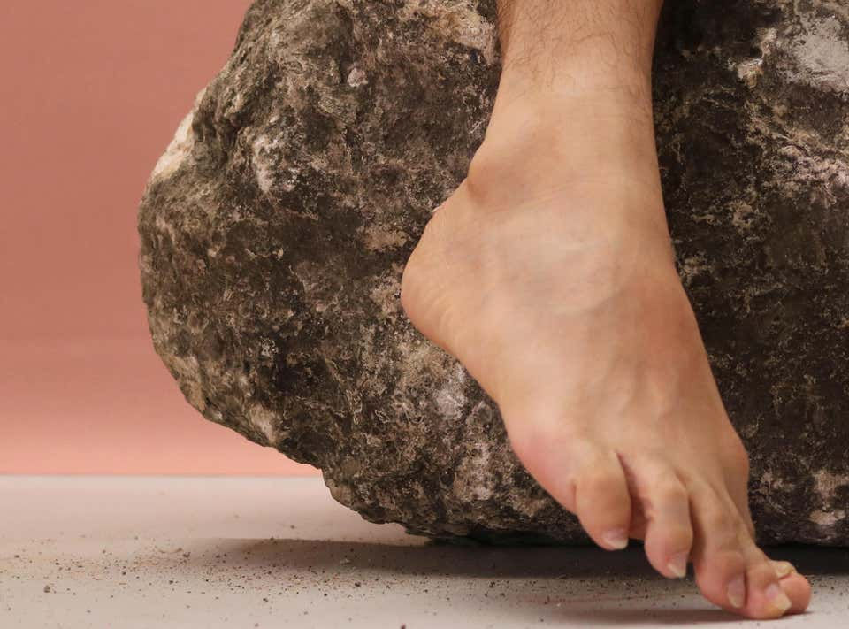 Thumbnail: Cropped view emphasizing posture and physical constraint in La Piedra Sustituta series artwork